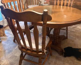 . . . oak dining table and chairs