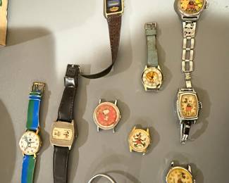 Collection of Vintage Character Watches: Mickey Mouse, Snoopy, Barbie, and others