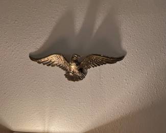 Awesome metal eagle will keep a watchful fly over any room you choose