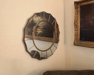 Call mid-century style mirror… But I think it’s a modern repop… yeah; makes it affordable!