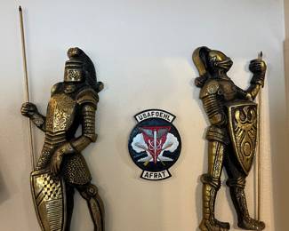 These mid-century night wall hangers will keep you safe from other mid-century dragon wall hangers, I guess.