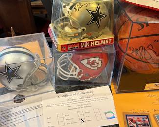 Several cool 👥 signed, mini helmets, including a Roger Staubach!!!!