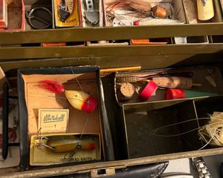 we found the coolest old tacklebox in the garage full of lots of amazing lures… With many in their original boxes!