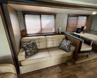 Really an incredible amount of room. Most appliances were never used and all work perfectly, the awning works great and the slide in and out works perfectly as well… The one downfall is that the original furniture could probably use recovering or replacing. He really didn’t use this thing hardly at all, but the fabric the furniture is covered in. Has has not survived time very well lower the Texas heat, but it would be very simple to recover them or replaced them, especially considering the fact that you’re saving over $20k on this thing versus New.