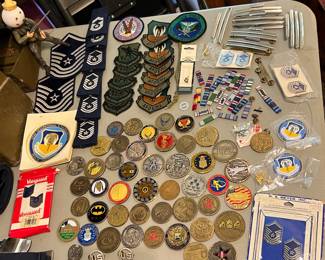 Lots of cool military, including a massive question challenge, Coins pens patches and  other military accoutrements