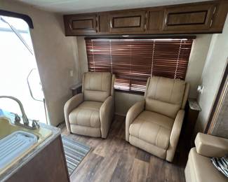 Has two of the original recliner chairs… They are functional but they could use recovering.