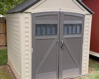 Rubbermaid Storage building. Approximately 7’ X 7’, needs left handle and taken apart to remove.