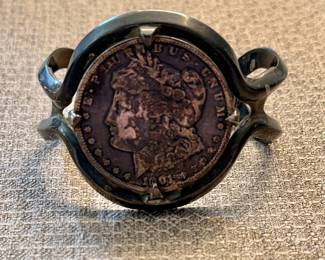 1900 Genuine Silver dollar wrapped in Sterling Bracelet, we could not see the mint mark