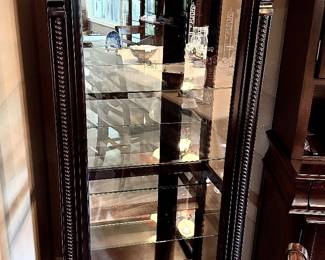All the glass and cabinet show beautifully, and all the glass was carefully cleaned. They show very well!