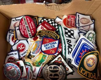 Box full of vintage patches