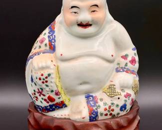 antique porcelain figure of Budai Laughing Buddha