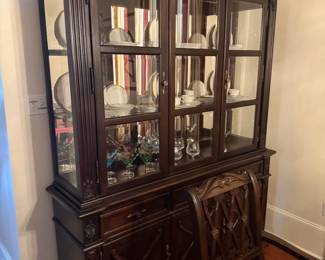 Lighted china cabinet with storage. 