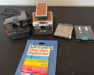 Vintage Polaroid SX-70 Land Camera, Polaroid Sonar One Step, and Film