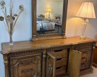 Ornate Carvings & Heavy Hardware