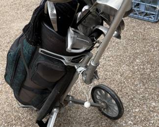 Golf clubs, bag and caddy!