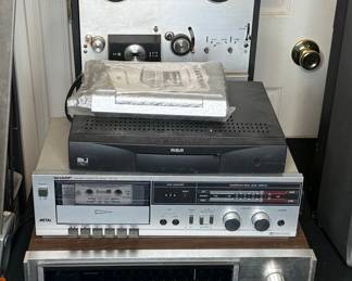 Sansui Stereo Receiver, Sharp Cassette Deck, and Reel-to-Reel Player