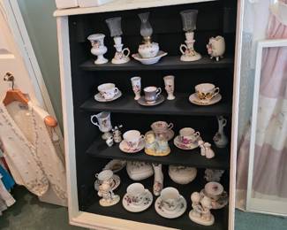 Display cabinet with china.