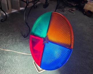 Penetray Motorized Color Wheel. Good working condition.  Lens has some melted spots, but still functional. Original box.