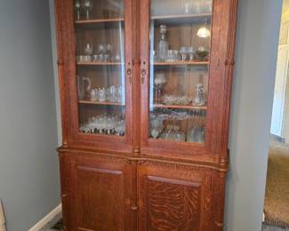 1800's Bar liquor Cabinet. A gorgeous piece of history!! Dimensions are 8 feet tall, 58 inches wide and 19 inches deep. Can potentially be used as two separated pieces, top and bottom. 