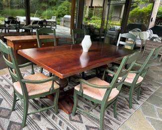 Solid wood dining table with 2 extending leafs  (chairs also available). 