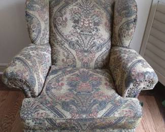 Arm Chair with carved feet and brass stud upholstery