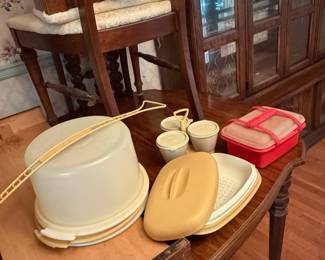 	#66		4 piece Tupperware lot including condiment/candy set, vegetable steamer, tall cake carrier with handle and extra plates, and lunch box set	 $ 25.00 																							