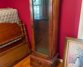 	#34		Antique gun cabinet with glass door, drawer, and keys (approx. 22–44 x 17.5 x 31)	 $ 200.00 																							