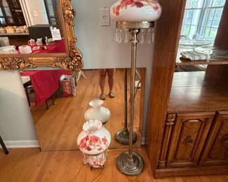 	#43		Vintage painted milk glass hurricane floor lamp with weighted brass base. 61".	 $ 100.00 																							 	#44		Vintage painted milk glass “Gone with the Wind” era parlor lamp. 21".	 $ 75.00 																							