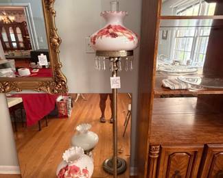 	#43		Vintage painted milk glass hurricane floor lamp with weighted brass base. 61".	 $ 100.00 																							