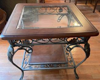 	#16		Glass-top side table with faux leather insert and pewter grapevine base (26 x 26 x 22)	 $ 75.00 																							