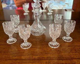 	#52		West Germany Hofbauer “Byrdes” cordial decanter with stopper and 6 cordial glasses. Decanter 6.5", glasses 3".	 $ 35.00 																							