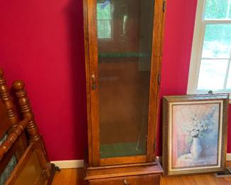 	#34		Antique gun cabinet with glass door, drawer, and keys (approx. 22–44 x 17.5 x 31)	 $ 200.00 																							