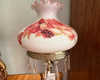 	#43		Vintage painted milk glass hurricane floor lamp with weighted brass base. 61".	 $ 100.00 																							