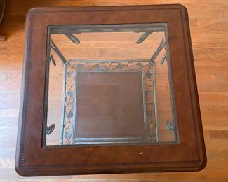 	#16		Glass-top side table with faux leather insert and pewter grapevine base (26 x 26 x 22)	 $ 75.00 																							