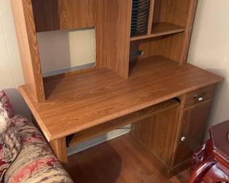 	#10		Laminate desk with drawer, cabinet door, keyboard tray, and shelf (47 x 22 x 54)	 $ 15.00 																							