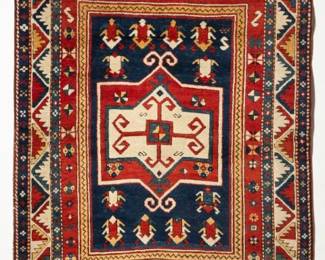 Seventyfive Antique Caucasian Rugs
