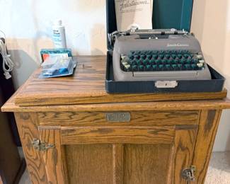 Whitehead vintage wooden icebox + vintage typewriter