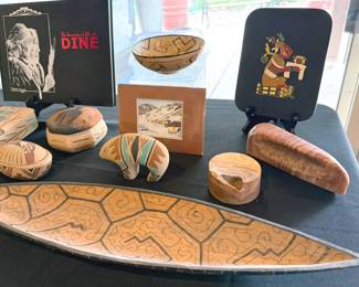 Assorted Native American art + Ucayali (Peru) river basin canoe replica 