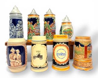 8 Beer Steins with Reliefs