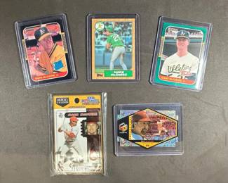 Mark McGwire Lot includes 87 Donruss Rated Rookie and The Rookies, and 87 Topps Rookie see back