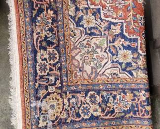 MID SIZE PERSIAN RUG.