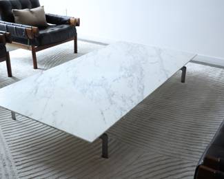 PAOLO NAVA + ANTONIO CITTERIO 'Diesis' coffee table, 1979 Marble, cast aluminum. Manufactured by B&B Italia, Italy.