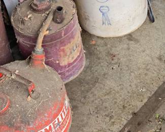 Old gas cans, crock