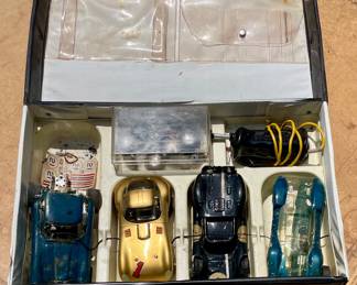 VINTAGE OFFICIAL SLOT CAR RACING CASE AND 4-CARS