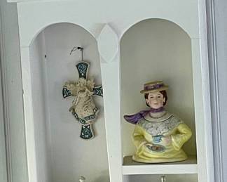 PAINTED WALL SHELF, TEAPOTS, CUPS, CROSSES
