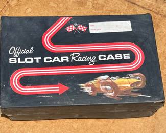 VINTAGE OFFICIAL SLOT CAR RACING CASE AND 4-CARS