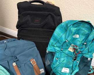Backpacks by Tumi, Northface & Hershal