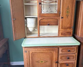 Hoosier vintage bread prep kitchen cabinet with primal flower dispenser 