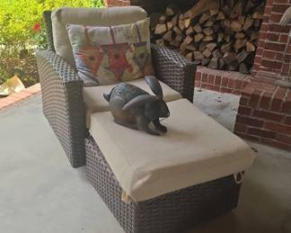 Wicker Patio Chair with Ottoman and Decorative Bunny Sculpture