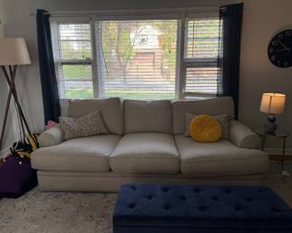 Couch in great condition  blue velvet ottoman 
